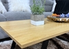 Picture of HENMAN 110 RECTANGLE TOP AND FLARED LEG COFFEE TABLE *OAK AND BLACK